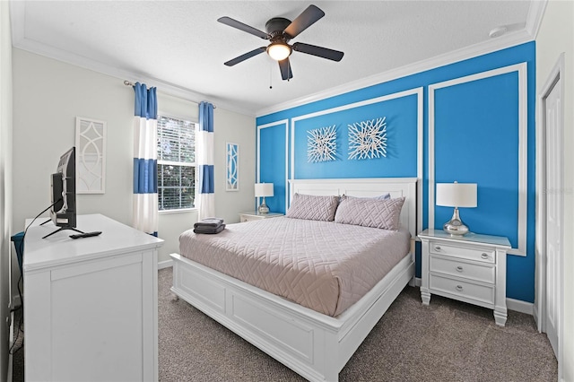 carpeted bedroom with ceiling fan, a textured ceiling, and ornamental molding