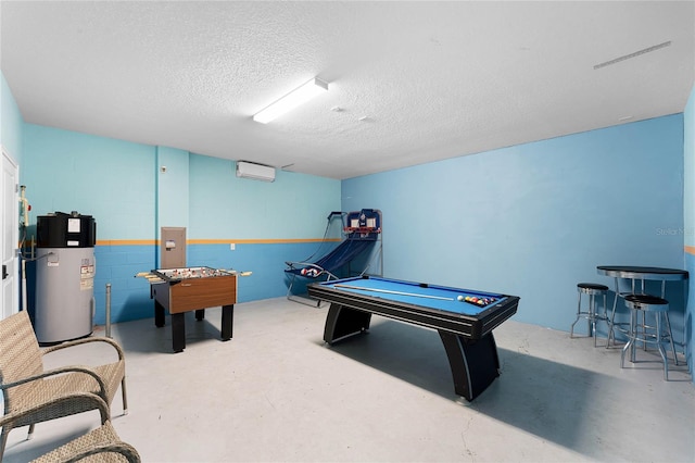 rec room featuring electric panel, concrete floors, a textured ceiling, water heater, and billiards