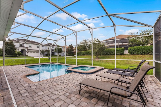 view of pool featuring an in ground hot tub, a patio, glass enclosure, and a lawn