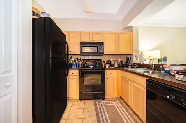 kitchen featuring sink, tasteful backsplash, light brown cabinetry, black appliances, and ornamental molding