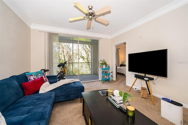 carpeted living room with ceiling fan and crown molding