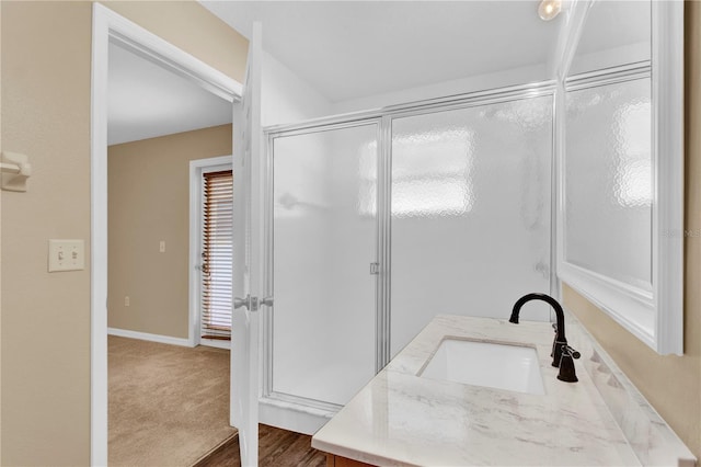 bathroom featuring vanity and walk in shower