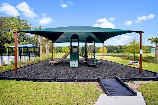 view of playground featuring a lawn