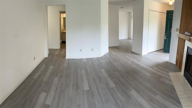 empty room with light hardwood / wood-style floors