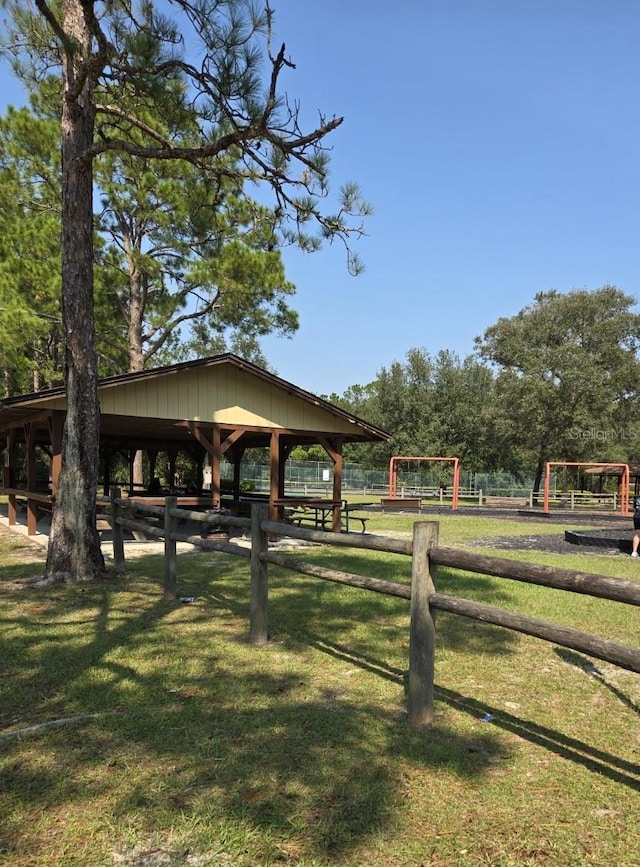surrounding community with a lawn