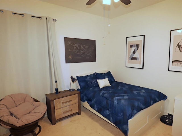 bedroom featuring ceiling fan and light colored carpet