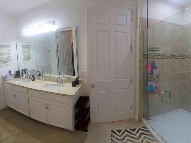 bathroom with an enclosed shower and vanity