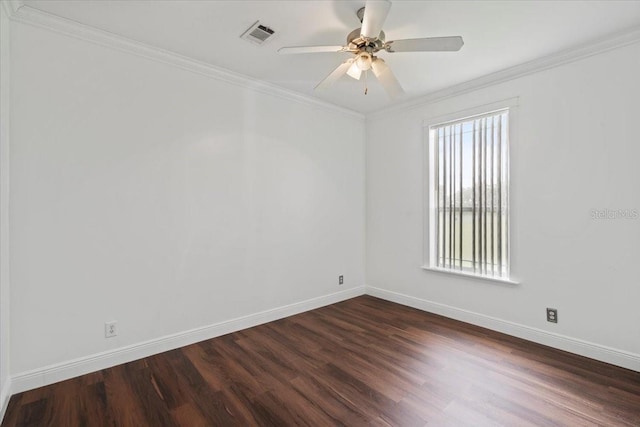 spare room featuring ornamental molding, ceiling fan, and dark hardwood / wood-style flooring