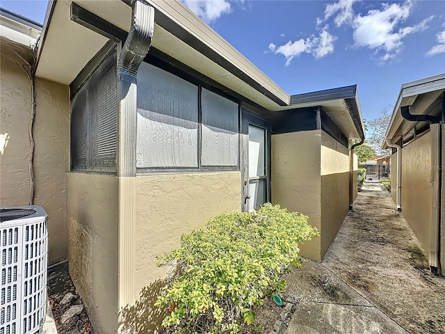 view of property exterior with central air condition unit