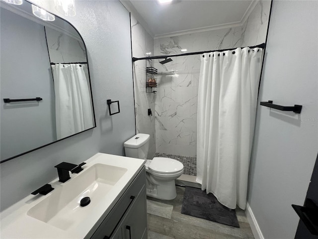 bathroom featuring curtained shower, vanity, and toilet