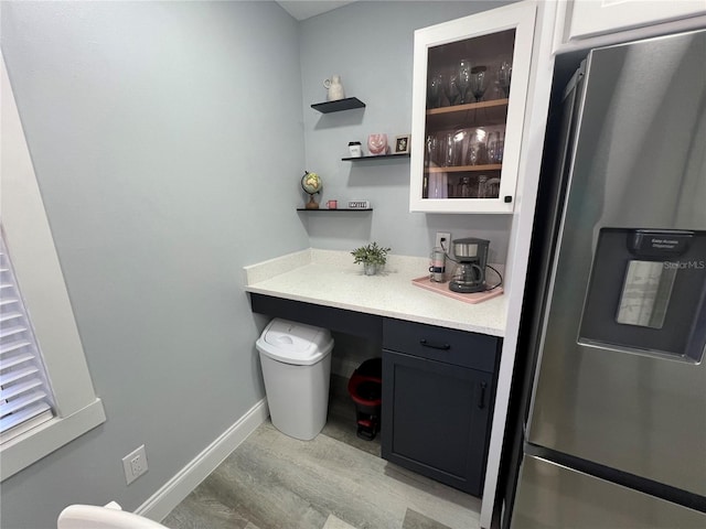 bathroom featuring vanity and wood-type flooring