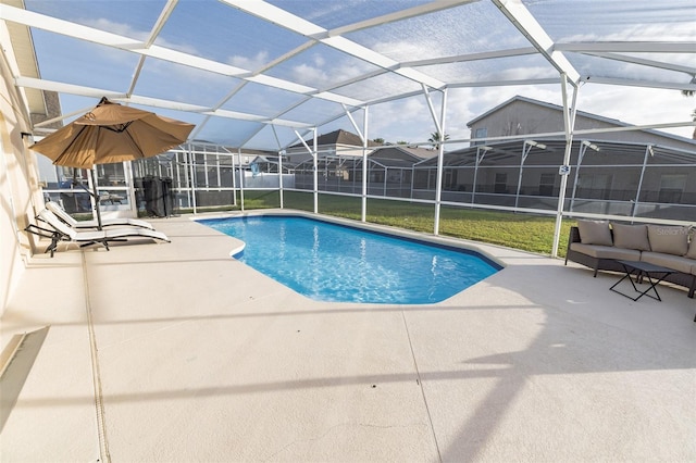 view of pool featuring a patio and a lanai