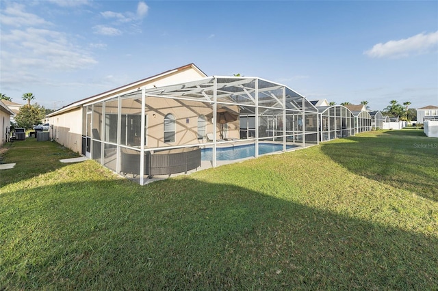 view of yard featuring glass enclosure