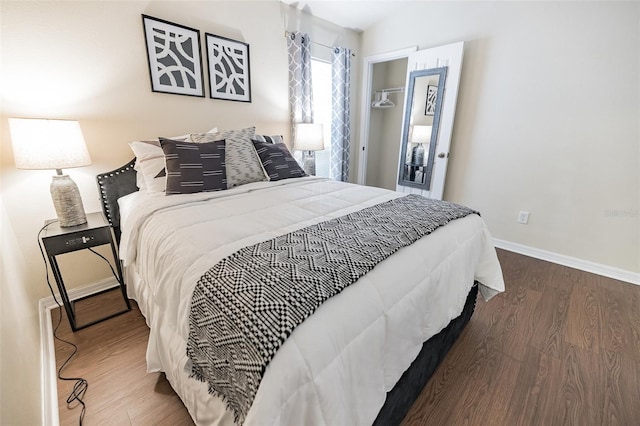 bedroom with wood-type flooring