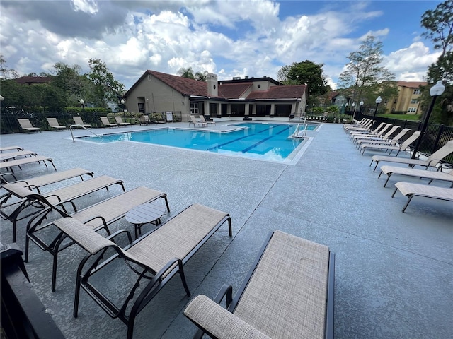 view of swimming pool with a patio area