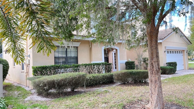 view of front of property featuring a garage