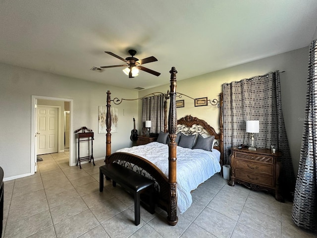 bedroom with light tile patterned flooring and ceiling fan