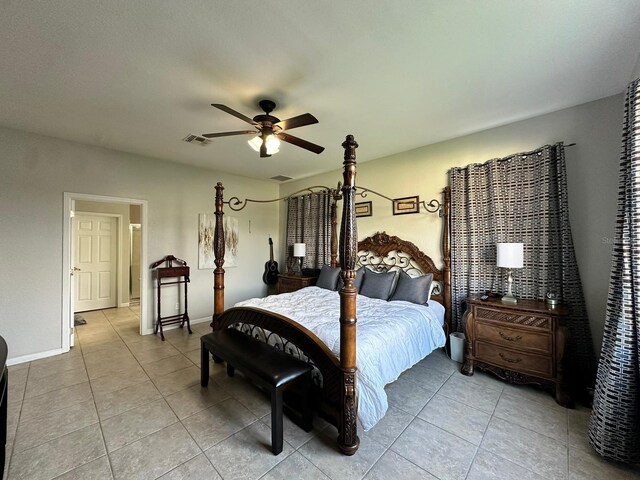2321 Hinsdale Dr, Kissimmee, FL 34741 - bedroom featuring light tile patterned floors and a ceiling fan