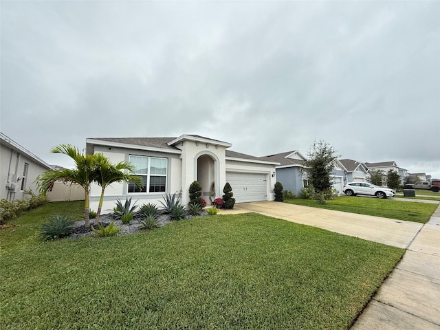 ranch-style home with a front yard and a garage