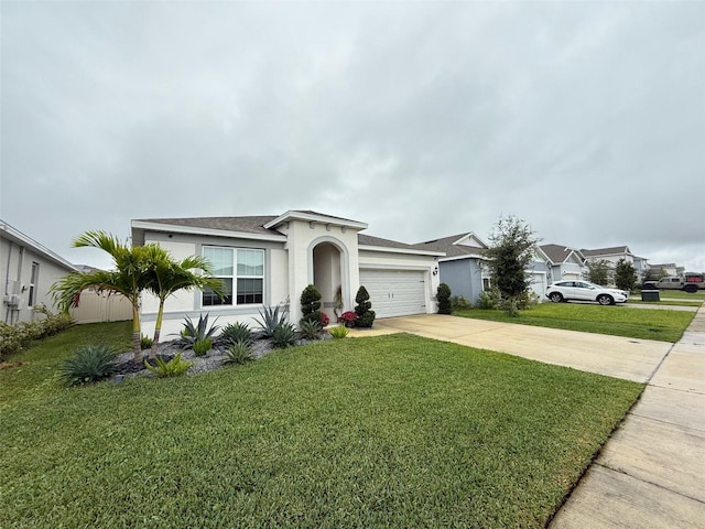 ranch-style house with a front yard and a garage