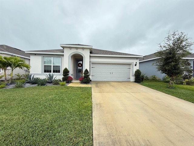 ranch-style house with a garage and a front yard