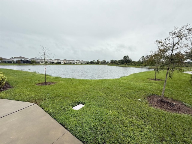 view of yard with a water view