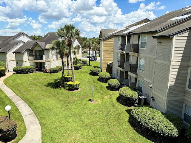 exterior space with central air condition unit and a balcony