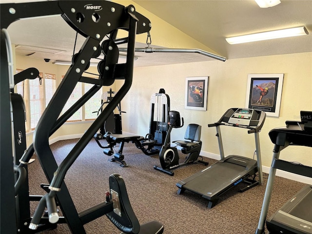 exercise room with a textured ceiling