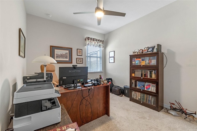 home office featuring ceiling fan and light colored carpet