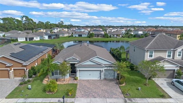 bird's eye view with a water view