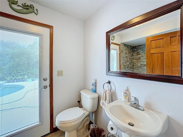 bathroom with sink and toilet