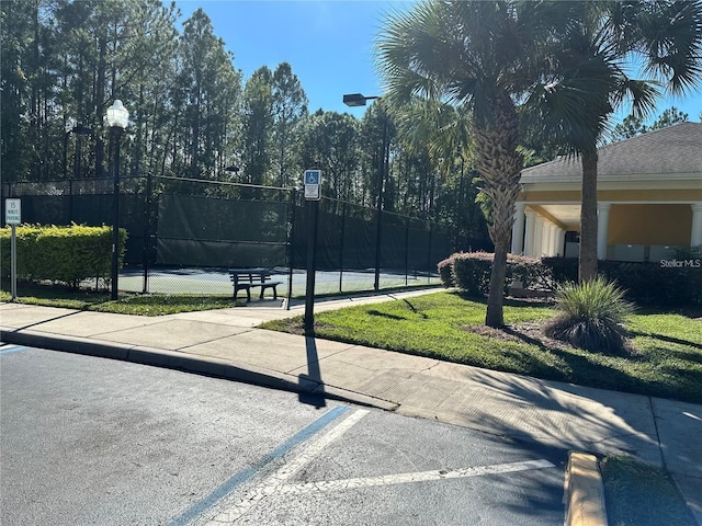 view of sport court with tennis court