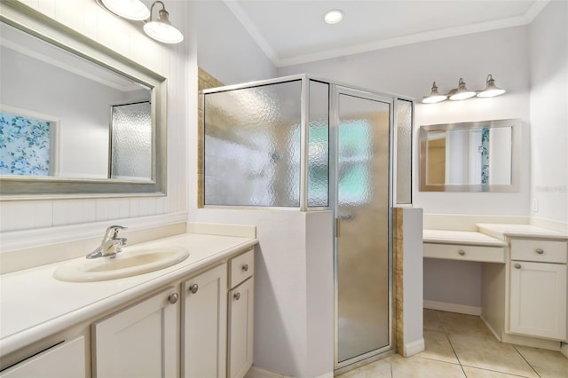 bathroom with vanity, ornamental molding, walk in shower, and tile patterned floors