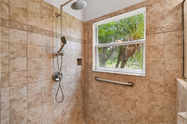 bathroom featuring tiled shower