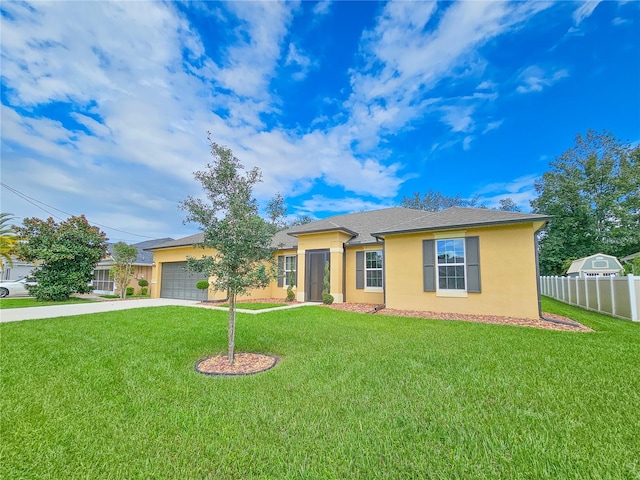 ranch-style home with a front yard and a garage