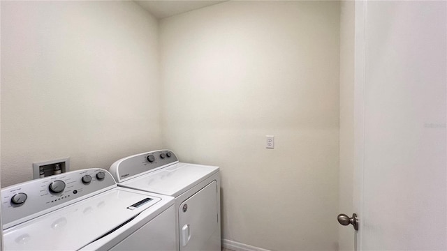 washroom featuring separate washer and dryer