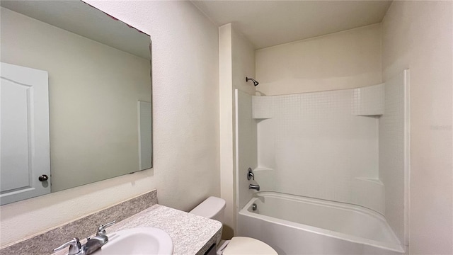 full bathroom featuring vanity, toilet, and tub / shower combination