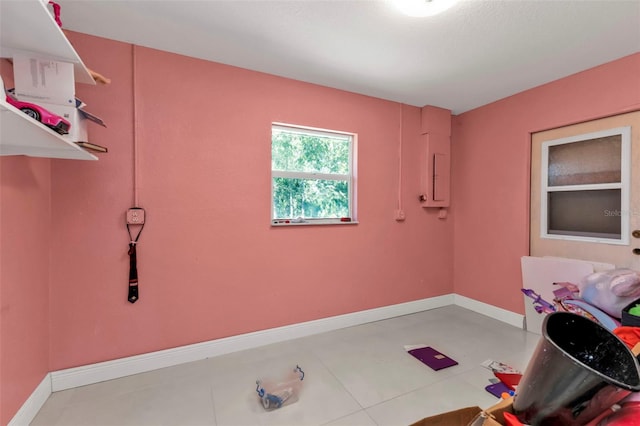 interior space with light tile patterned floors