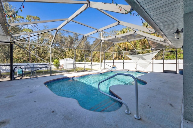 view of pool featuring a patio and a lanai