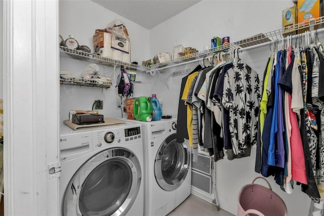 washroom with washer and dryer