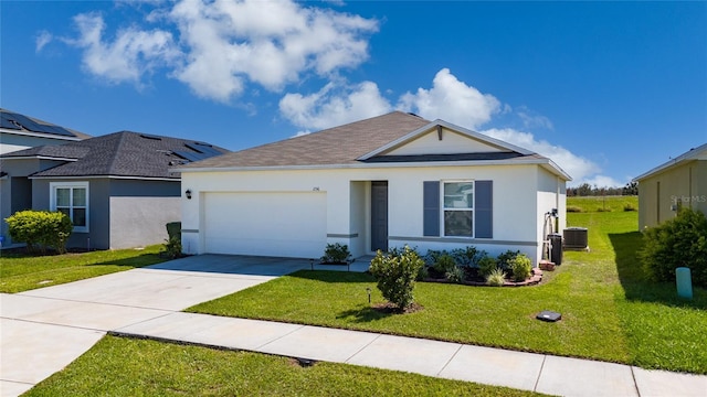 single story home featuring a garage, cooling unit, and a front lawn