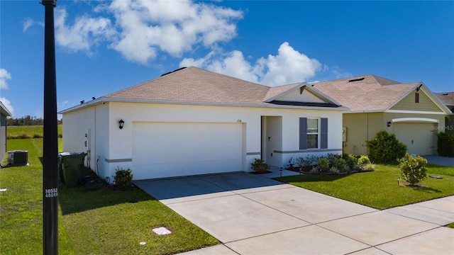 ranch-style house with a garage, a front lawn, and central AC unit