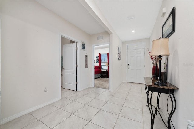 foyer entrance featuring light tile patterned floors