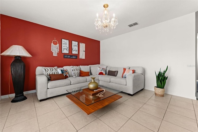 tiled living room with an inviting chandelier