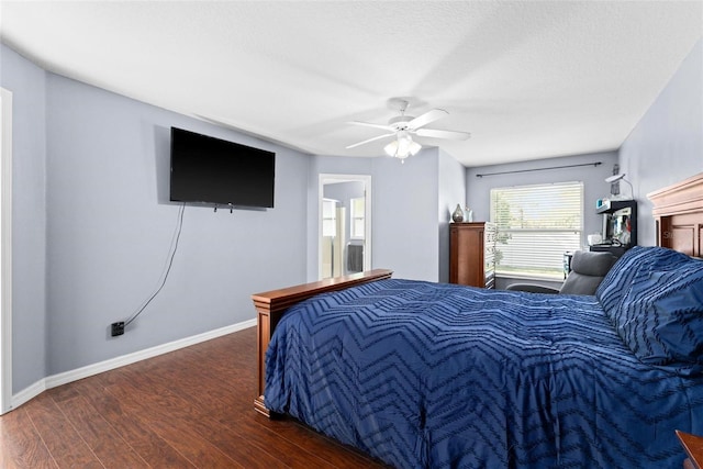 bedroom featuring dark hardwood / wood-style floors and ceiling fan