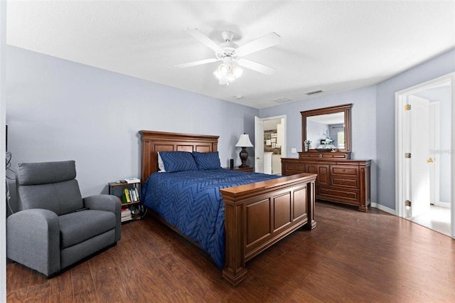 bedroom featuring ceiling fan and dark hardwood / wood-style flooring