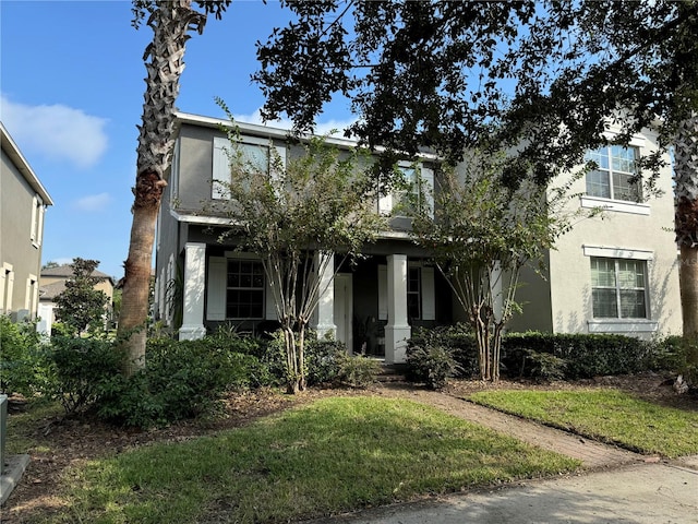 view of front of home featuring a front lawn