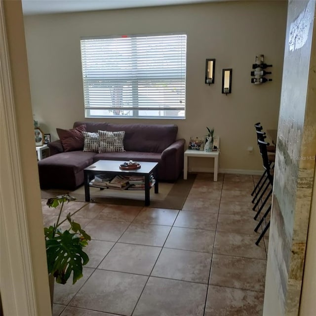 living room featuring tile patterned flooring