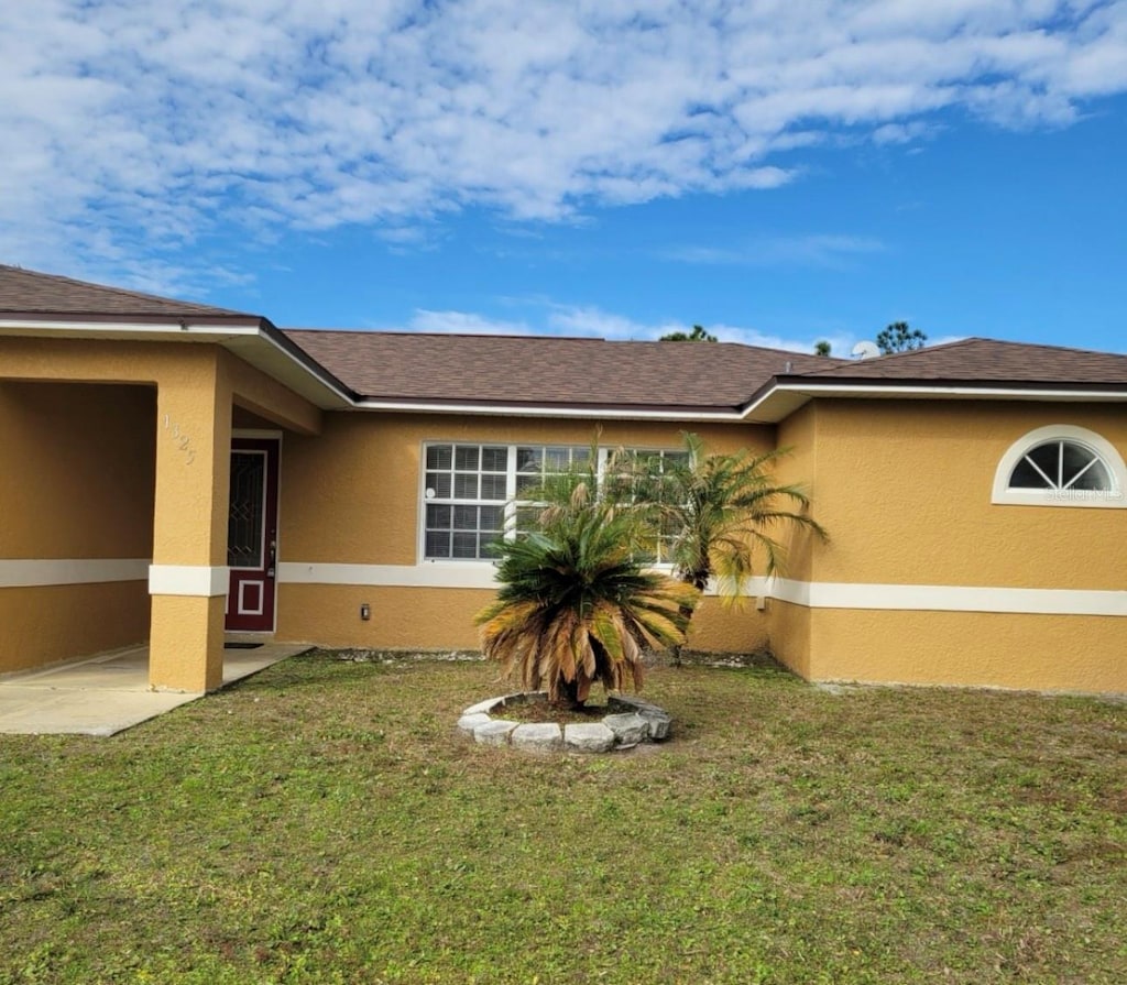 exterior space with a yard