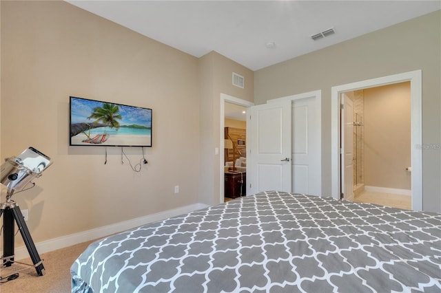 unfurnished bedroom with carpet flooring and ensuite bath